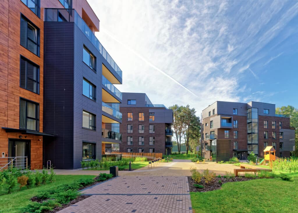 Benches at Modern european complex of apartment buildings